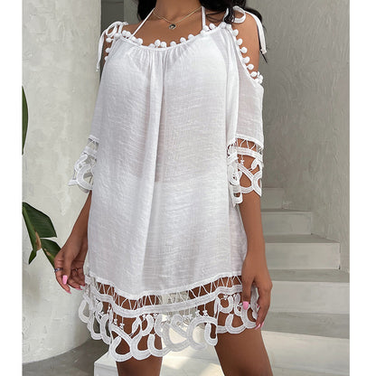 Tenue de plage blanche courte et brodée – une tenue estivale élégante