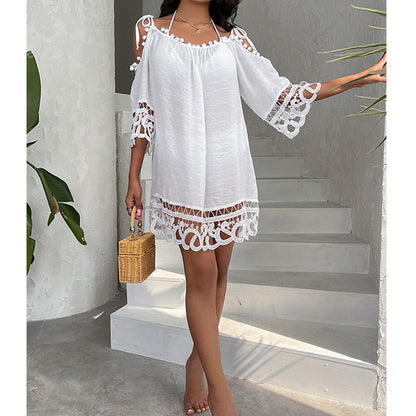Tenue de plage blanche courte et brodée – une tenue estivale élégante