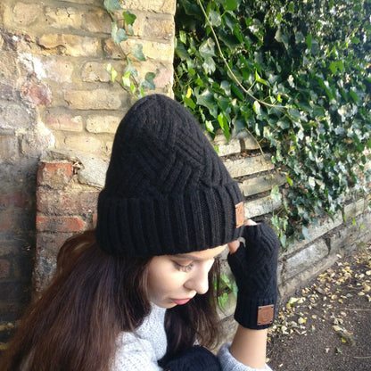 Women’s black cashmere knit beanie and matching gloves